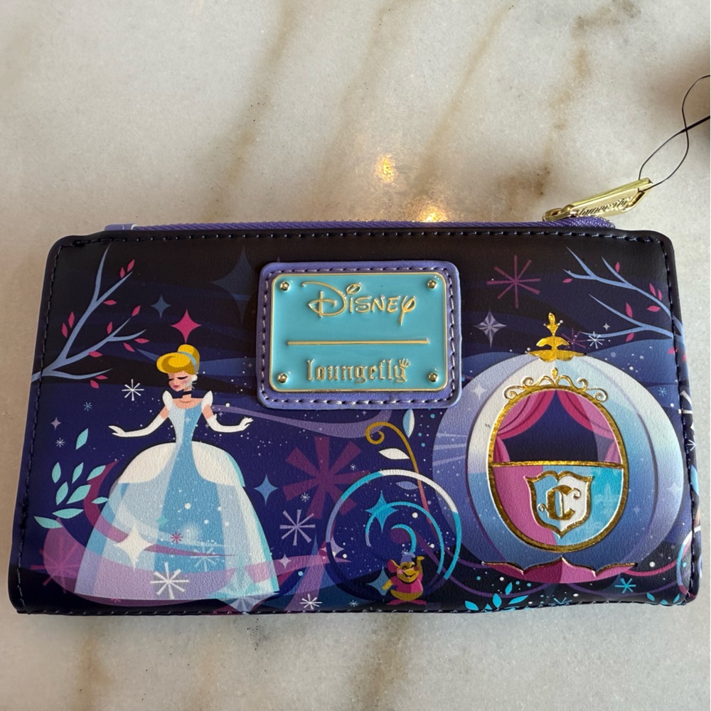 Brand new. Disney Princess Castle Wallet with Purple and Blue Accents